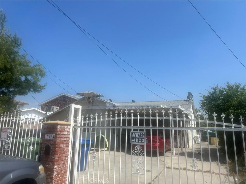 view of gate featuring fence private yard