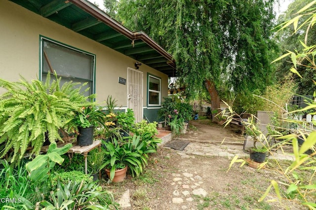 exterior space with stucco siding