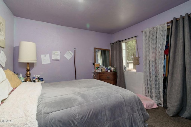 bedroom featuring carpet flooring