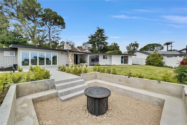 43 Rockinghorse Rd, Rancho Palos Verdes, CA 90275 - rear view of property with an outdoor fire pit and a chimney