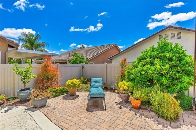 28345 Hearthside Dr, Menifee, CA 92584 - view of patio / terrace featuring a fenced backyard
