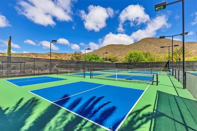 28345 Hearthside Dr, Menifee, CA 92584 - view of tennis court with fence, a mountain view, and community basketball court
