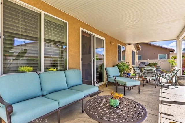 28345 Hearthside Dr, Menifee, CA 92584 - view of patio featuring an outdoor living space and fence