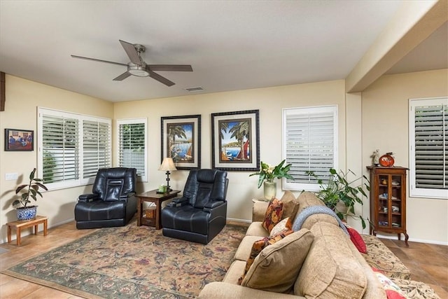 28345 Hearthside Dr, Menifee, CA 92584 - tiled living room with ceiling fan and baseboards