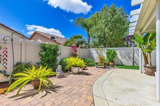 28345 Hearthside Dr, Menifee, CA 92584 - view of patio with a fenced backyard