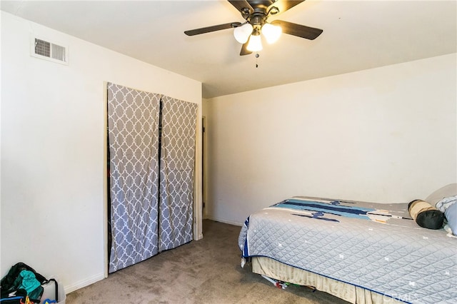 bedroom featuring ceiling fan, carpet, and visible vents