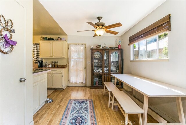 dining area featuring ceiling fan and light wood-type flooring