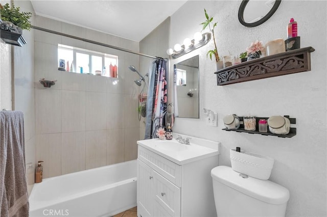 bathroom with vanity, shower / bathtub combination with curtain, and toilet