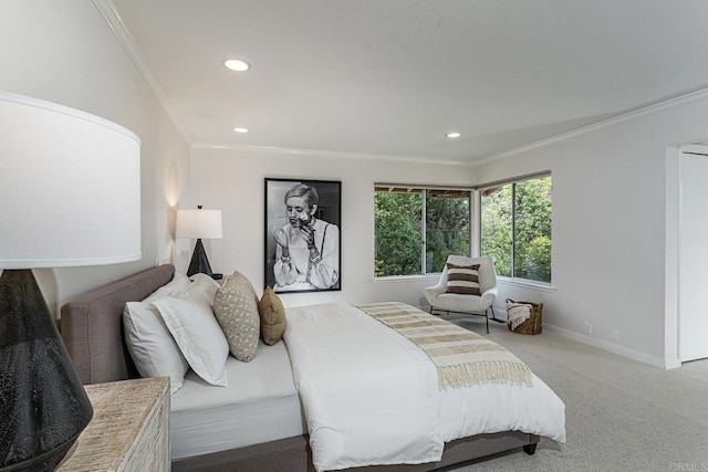 bedroom featuring crown molding, recessed lighting, and carpet floors