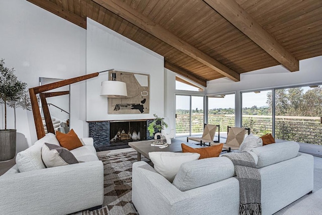 living area featuring stairway, wooden ceiling, high vaulted ceiling, and beam ceiling
