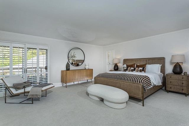 carpeted bedroom featuring crown molding