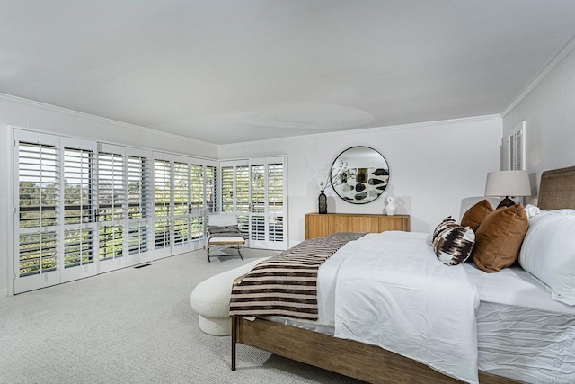 bedroom featuring crown molding and carpet floors
