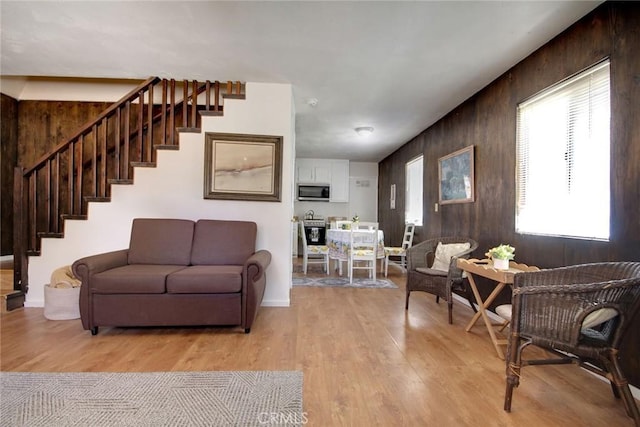 133 Holmes Ln, Sugarloaf, CA 92386 - living area featuring stairs and light wood finished floors
