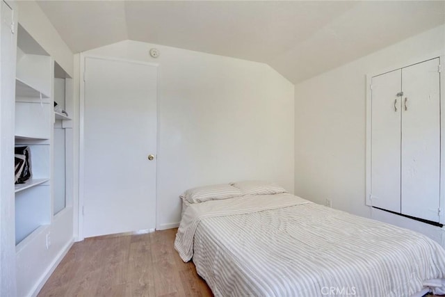 133 Holmes Ln, Sugarloaf, CA 92386 - bedroom featuring light wood-style floors and lofted ceiling