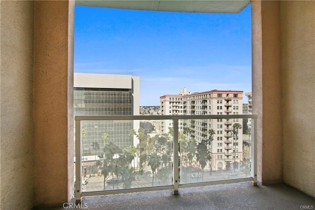 balcony featuring a city view