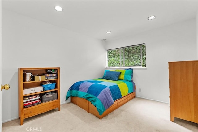 carpeted bedroom featuring recessed lighting and baseboards