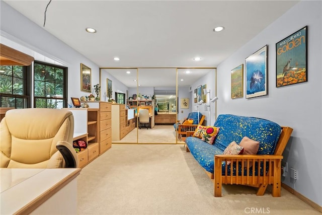 sitting room with carpet and recessed lighting