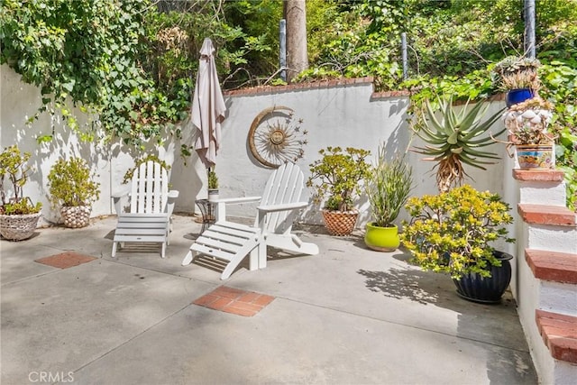 view of patio / terrace with fence