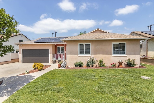 8227 Owens St, Sunland, CA 91040 - ranch-style house featuring a front yard, stucco siding, concrete driveway, an attached garage, and solar panels