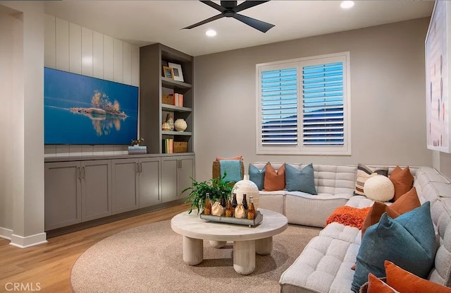 8638 Mission Villa Dr, Rosemead, CA 91770 - living room featuring recessed lighting, ceiling fan, built in shelves, and light wood-style floors