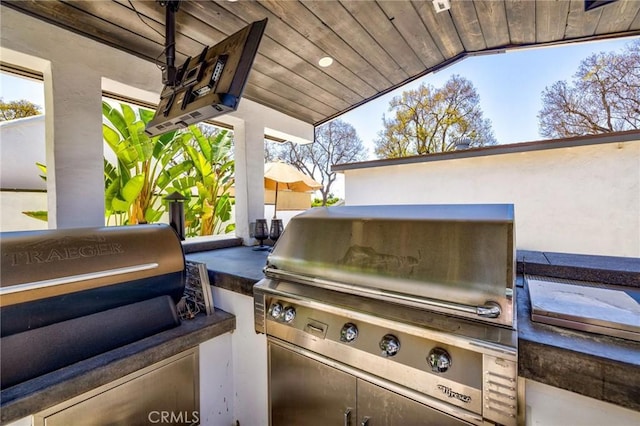 view of patio / terrace featuring exterior kitchen and area for grilling