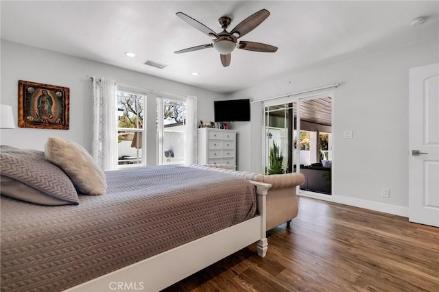 bedroom with visible vents, wood finished floors, access to exterior, baseboards, and recessed lighting