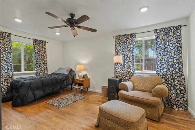 1489 Manzanita Ave, Chico, CA 95926 - bedroom with multiple windows, wood finished floors, baseboards, recessed lighting, and a ceiling fan