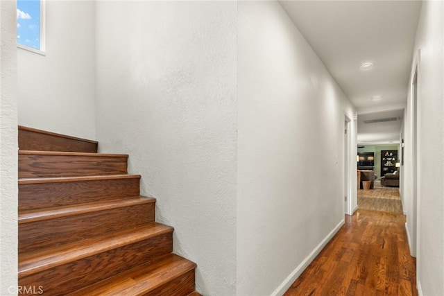 1489 Manzanita Ave, Chico, CA 95926 - stairway with wood finished floors, baseboards, and recessed lighting