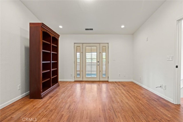 1489 Manzanita Ave, Chico, CA 95926 - empty room featuring light wood-style floors, baseboards, and recessed lighting
