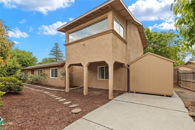 1489 Manzanita Ave, Chico, CA 95926 - back of property featuring stucco siding and a patio area