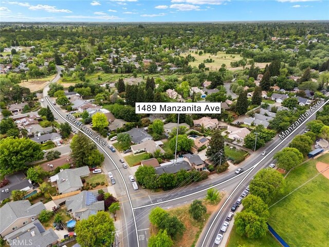 1489 Manzanita Ave, Chico, CA 95926 - aerial perspective of suburban area featuring property parcel outlined