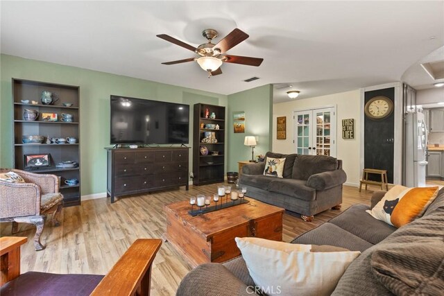 1489 Manzanita Ave, Chico, CA 95926 - living area featuring a ceiling fan, wood finished floors, and baseboards