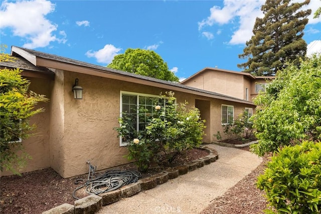 1489 Manzanita Ave, Chico, CA 95926 - view of side of home featuring stucco siding