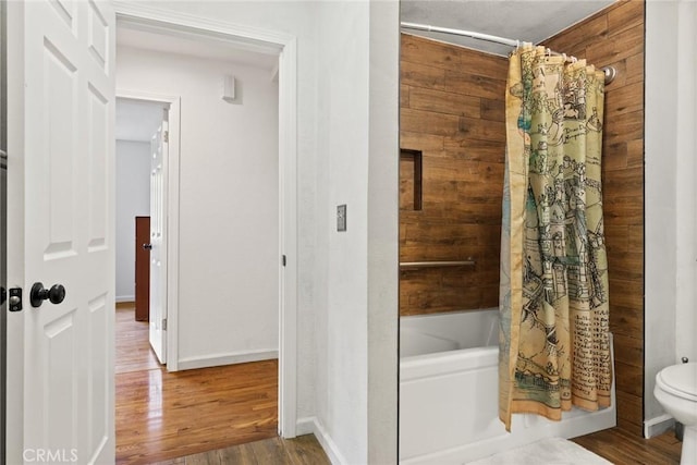 1489 Manzanita Ave, Chico, CA 95926 - bathroom with wood finished floors, shower / bathtub combination with curtain, toilet, and baseboards