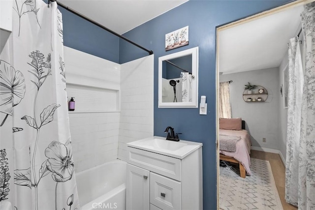 3241 Mills Ln, Crescenta, CA 91214 - bathroom with vanity, shower / bath combo, and wood finished floors