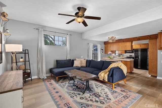 3241 Mills Ln, Crescenta, CA 91214 - living room with ceiling fan, light wood-type flooring, and baseboards