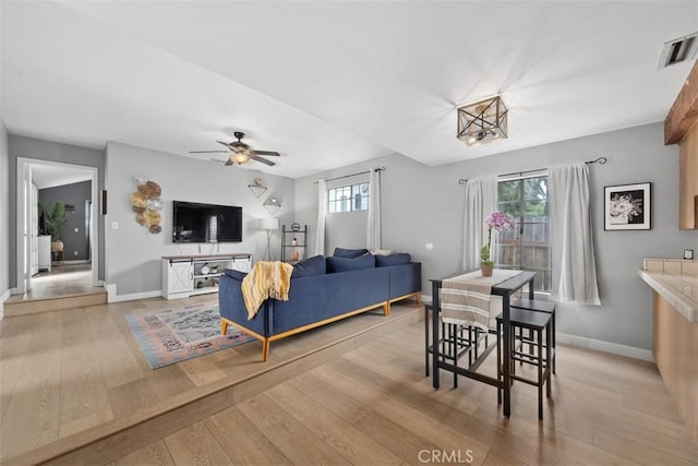 3241 Mills Ln, Crescenta, CA 91214 - living room with light wood-style floors, baseboards, and ceiling fan
