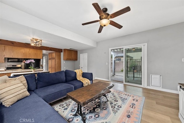 3241 Mills Ln, Crescenta, CA 91214 - living room featuring baseboards, a ceiling fan, and light wood finished floors