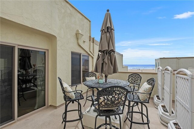 711 Pacific Coast Unit 325, Huntington Beach, CA 92648 - view of patio / terrace with a water view