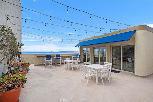 711 Pacific Coast Unit 325, Huntington Beach, CA 92648 - view of patio / terrace featuring outdoor dining space