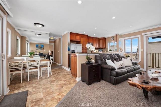 711 Pacific Coast Unit 325, Huntington Beach, CA 92648 - living room with crown molding, recessed lighting, and baseboards