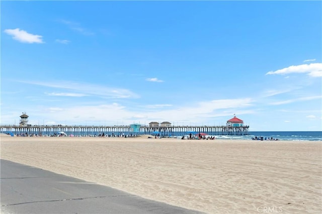711 Pacific Coast Unit 325, Huntington Beach, CA 92648 - water view with a beach view and a pier