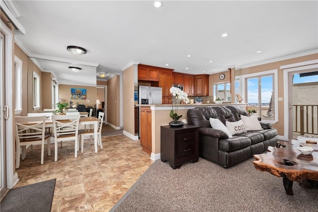 711 Pacific Coast Unit 325, Huntington Beach, CA 92648 - living room with recessed lighting, ornamental molding, and baseboards