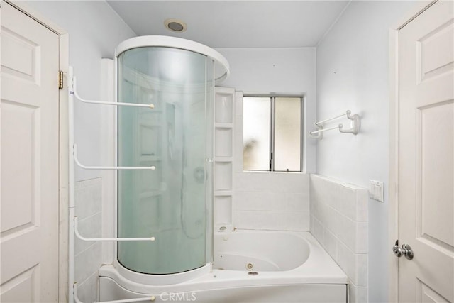 full bath featuring an enclosed shower and a jetted tub