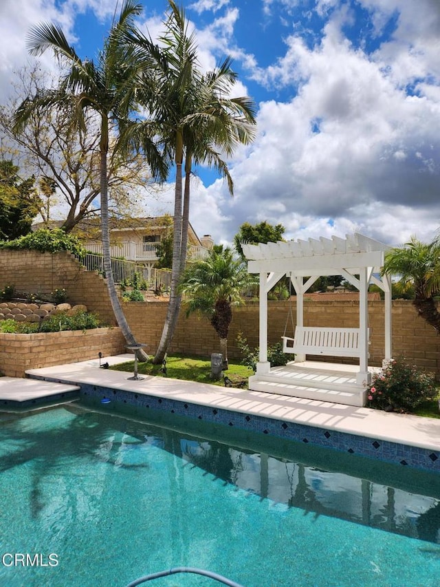 view of swimming pool with a fenced in pool, a pergola, and a fenced backyard