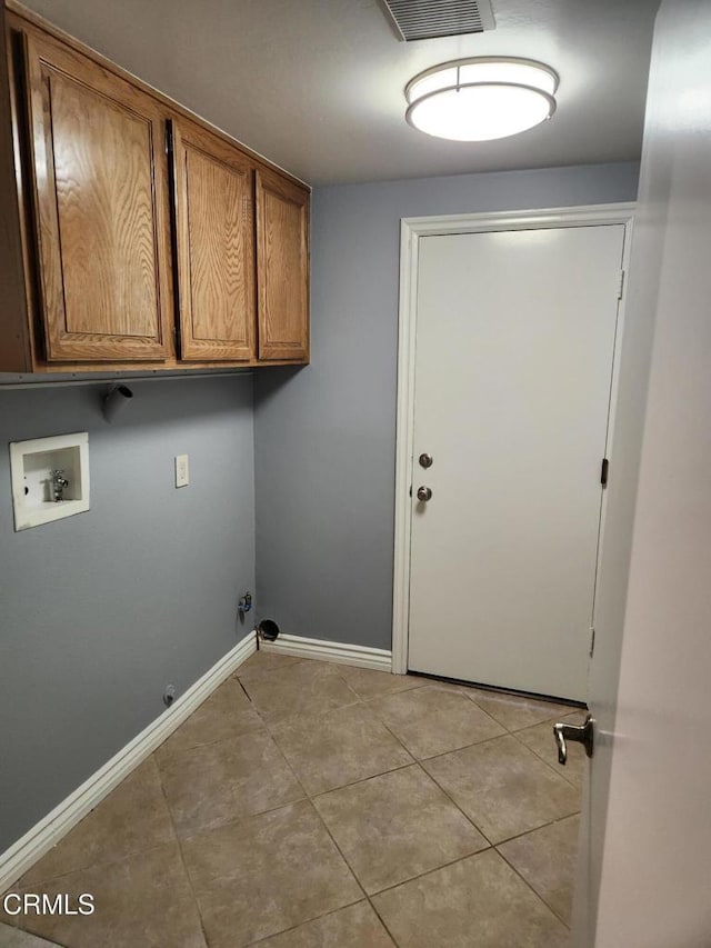 laundry area featuring visible vents, baseboards, hookup for a washing machine, gas dryer hookup, and cabinet space