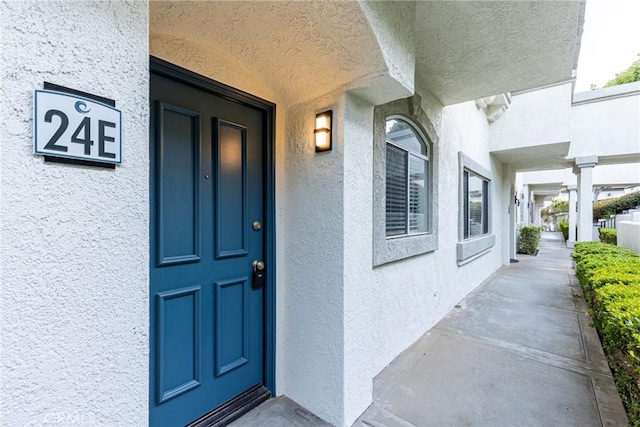 30902 Clubhouse Dr Unit 24E, Laguna Niguel, CA 92677 - property entrance with stucco siding
