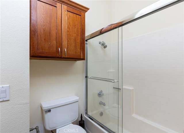 30902 Clubhouse Dr Unit 24E, Laguna Niguel, CA 92677 - bathroom with bath / shower combo with glass door and toilet