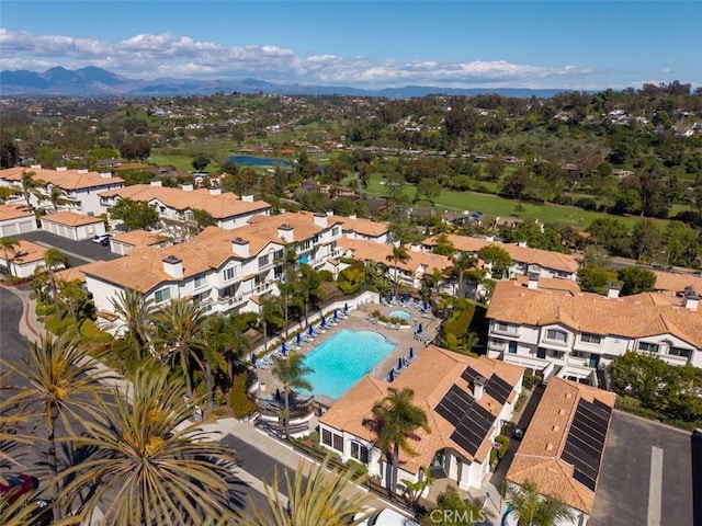 30902 Clubhouse Dr Unit 24E, Laguna Niguel, CA 92677 - aerial view of property and surrounding area with a pool area