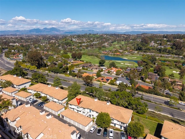 30902 Clubhouse Dr Unit 24E, Laguna Niguel, CA 92677 - aerial perspective of suburban area with a golf club and a water and mountain view